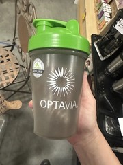 OPTAVIA BPA-Free 20 fl oz Plastic Shaker Bottle, Screw-on Green Lid, Clear