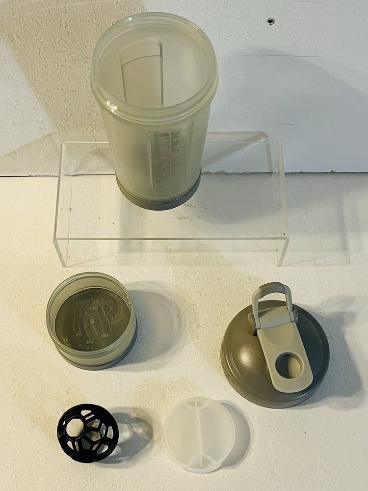BlenderBottle ProStak 16oz. Shaker Bottle with 3 Pill Organizers and Storage.