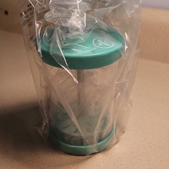 12 fl oz Clear/Green Reusable Plastic Whipped Cream Maker with Screw-On Lid